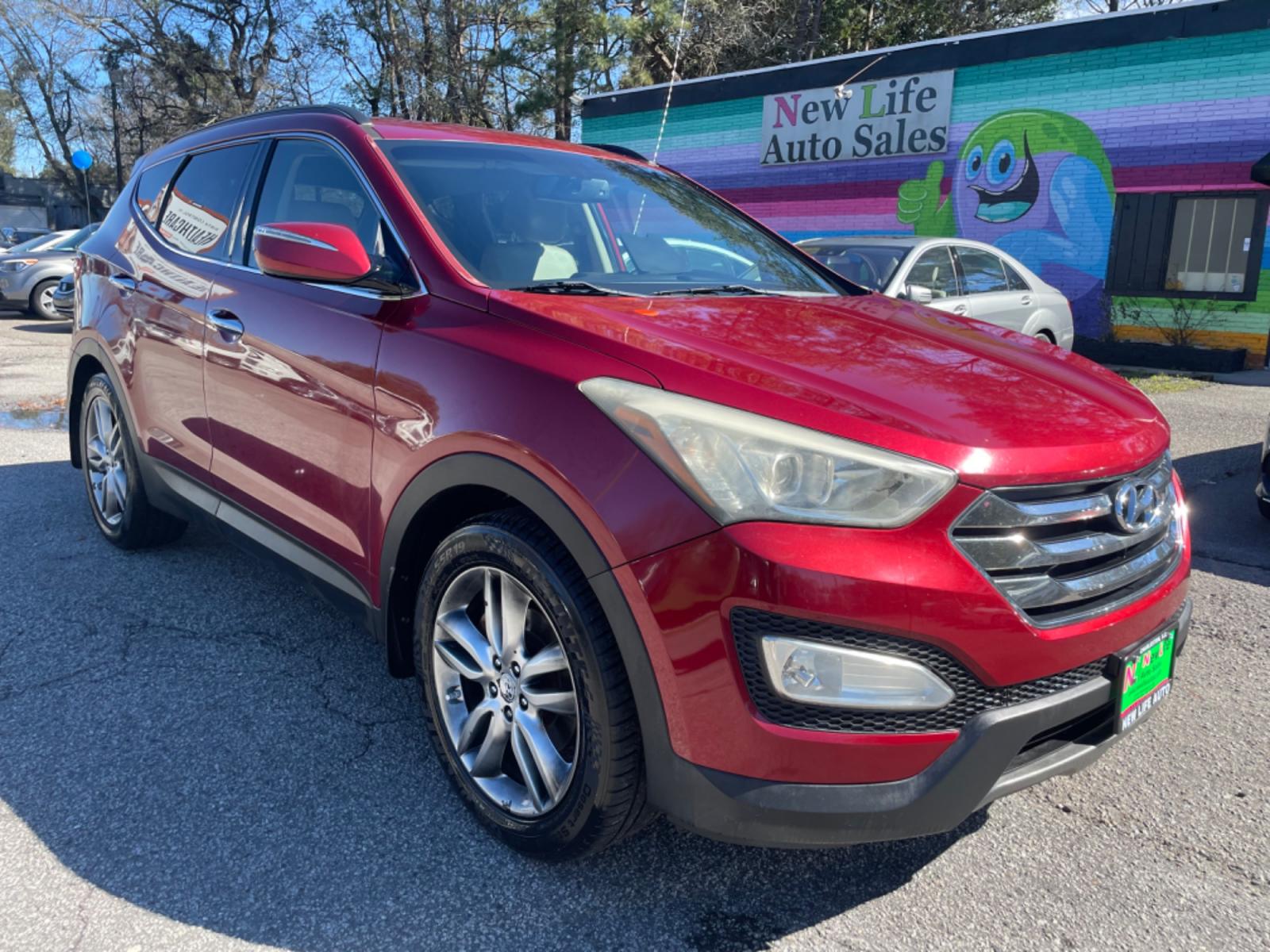 2013 RED HYUNDAI SANTA FE SPORT 2.0T (5XYZU3LA3DG) with an 2.0L engine, Automatic transmission, located at 5103 Dorchester Rd., Charleston, SC, 29418-5607, (843) 767-1122, 36.245171, -115.228050 - Leather, CD/AUX/Sat/Bluetooth, Dual Climate, Power Everything (windows, locks, seats, mirrors), Heated Seats, Rear Heated Seats, Push Button Start, Keyless Entry, Alloy Wheels. Local Trade-in!! Located at New Life Auto Sales! 2023 WINNER for Post & Courier's Charleston's Choice Pre-owned Car Dealer - Photo #0